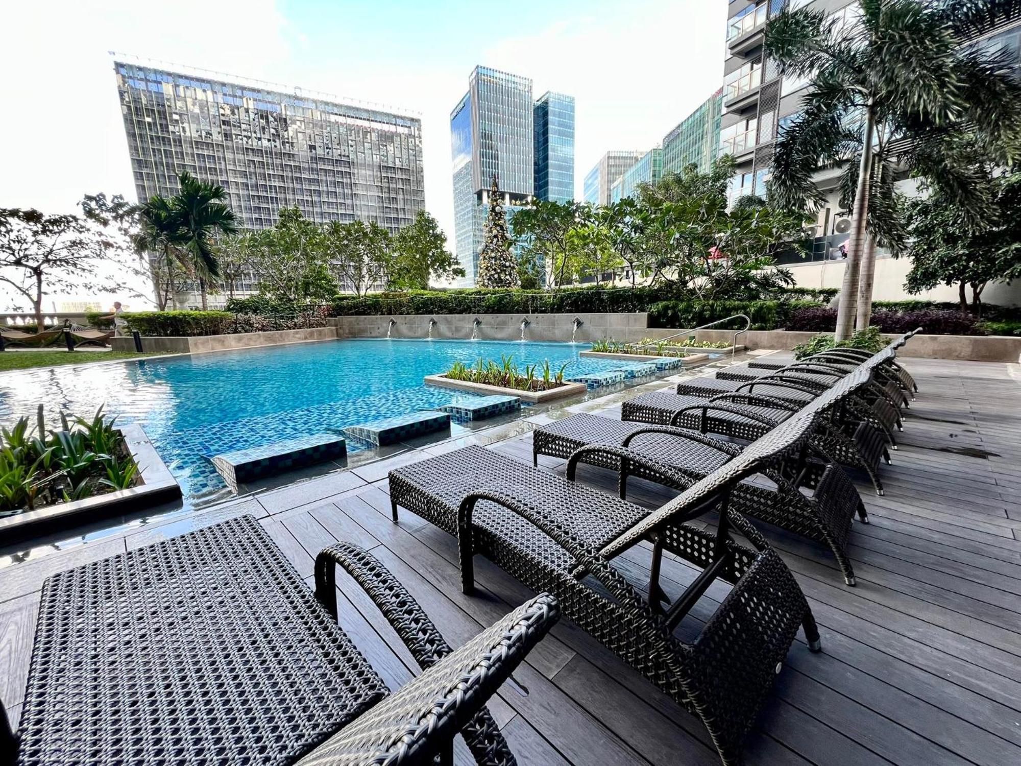 تاغويغ Hotel Vibe Condo At Uptown Parksuites Bgc المظهر الخارجي الصورة