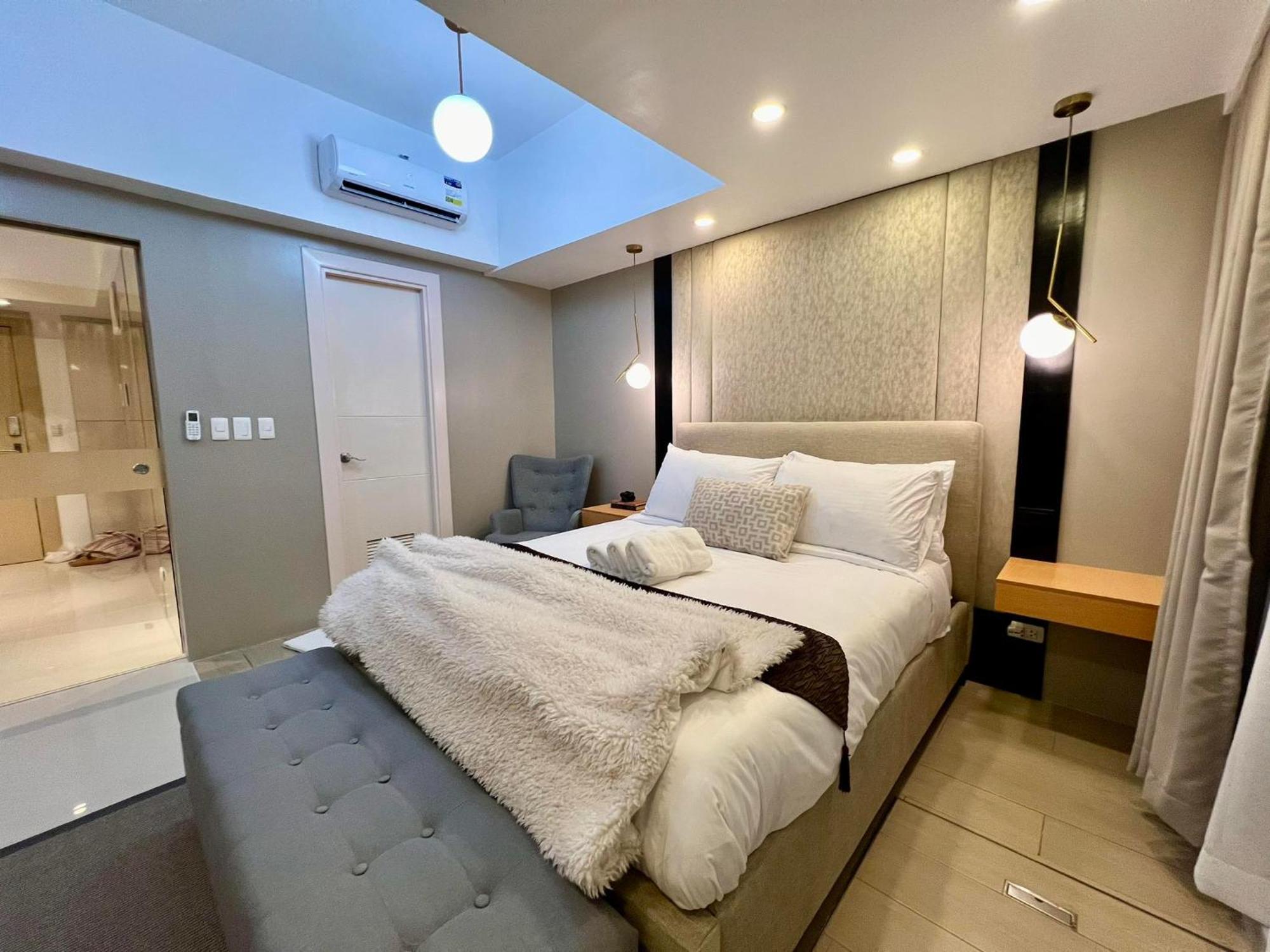 تاغويغ Hotel Vibe Condo At Uptown Parksuites Bgc المظهر الخارجي الصورة