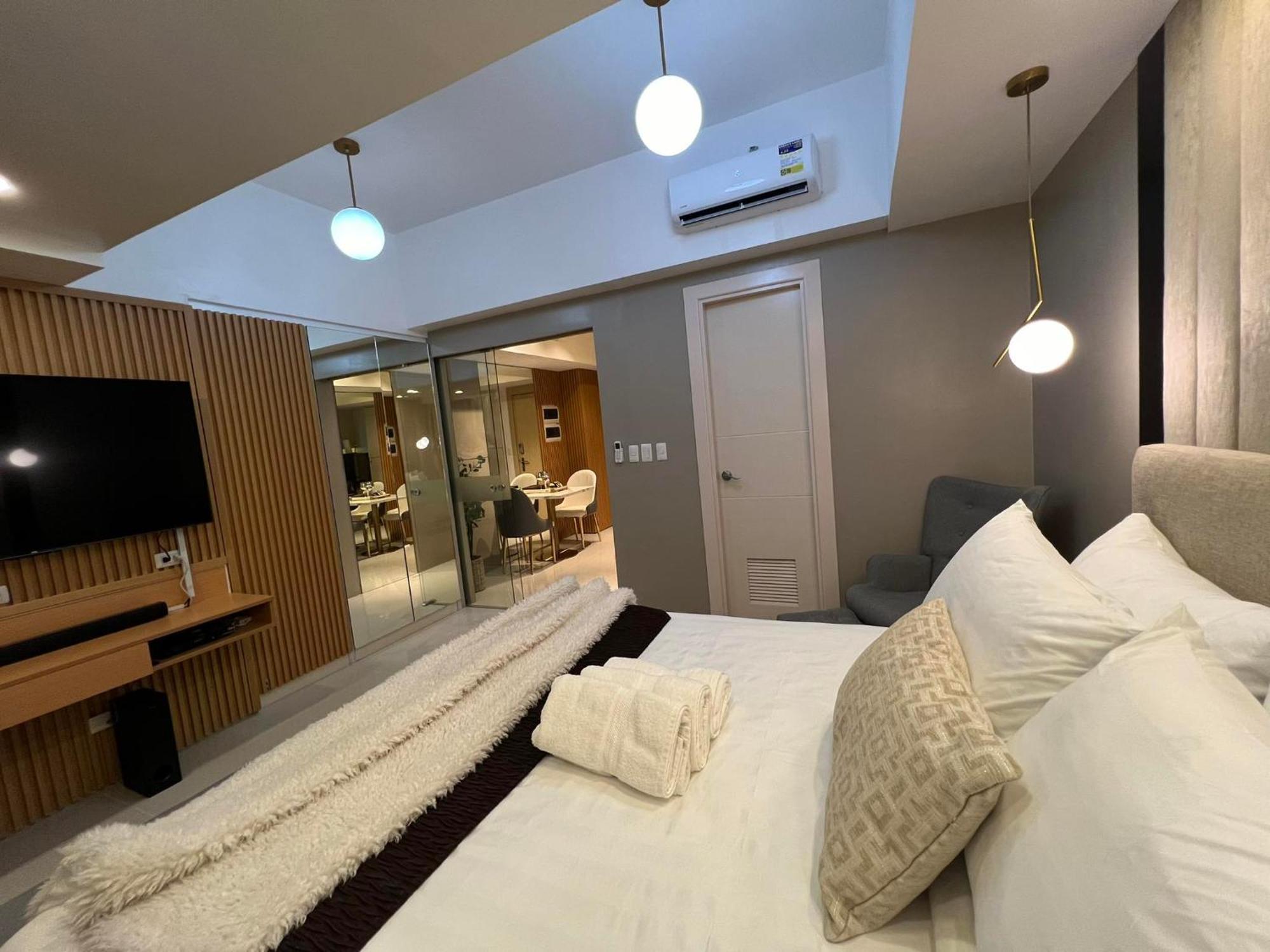 تاغويغ Hotel Vibe Condo At Uptown Parksuites Bgc المظهر الخارجي الصورة